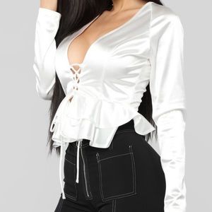 Long sleeve top with ruffles and plunge neck